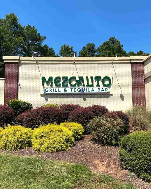 Mezcalito Grill and Tequila Bar monument sign by landscaped entrance, monument sign, by Capital Sign Solutions