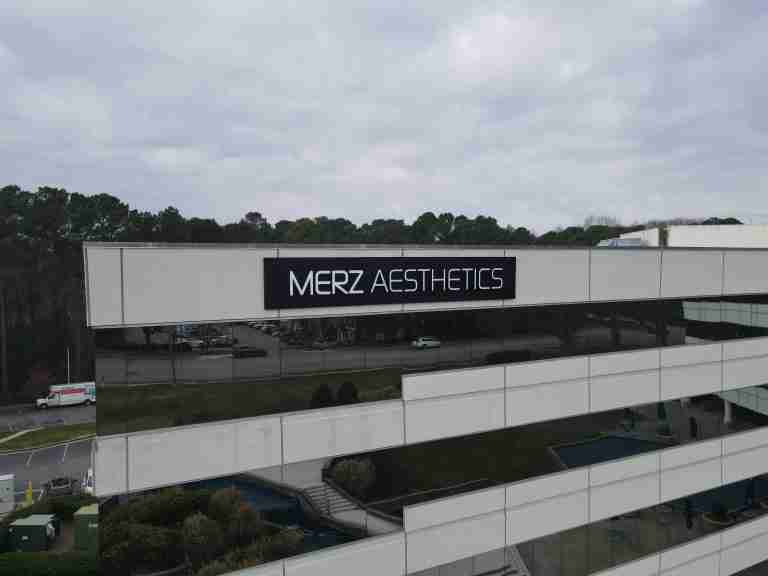 MERZ aesthetics signage on side of building